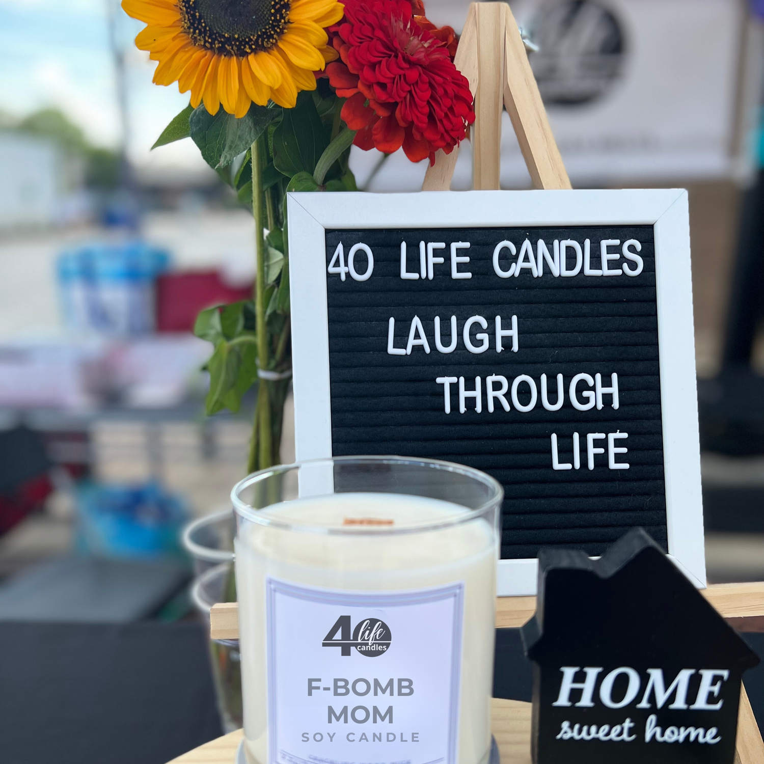 candle sign at a farmers market