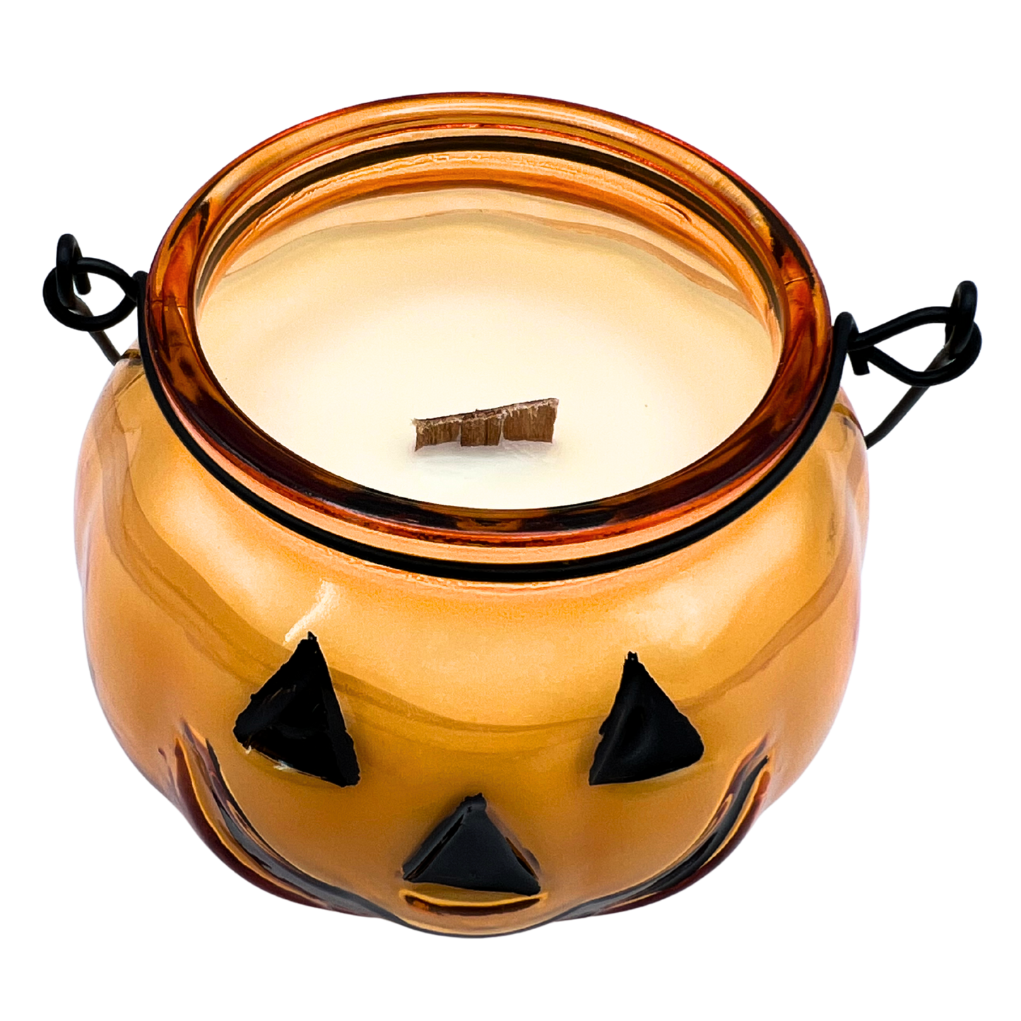 Halloween-themed candle in a glass jar with black triangle decorations on a white background