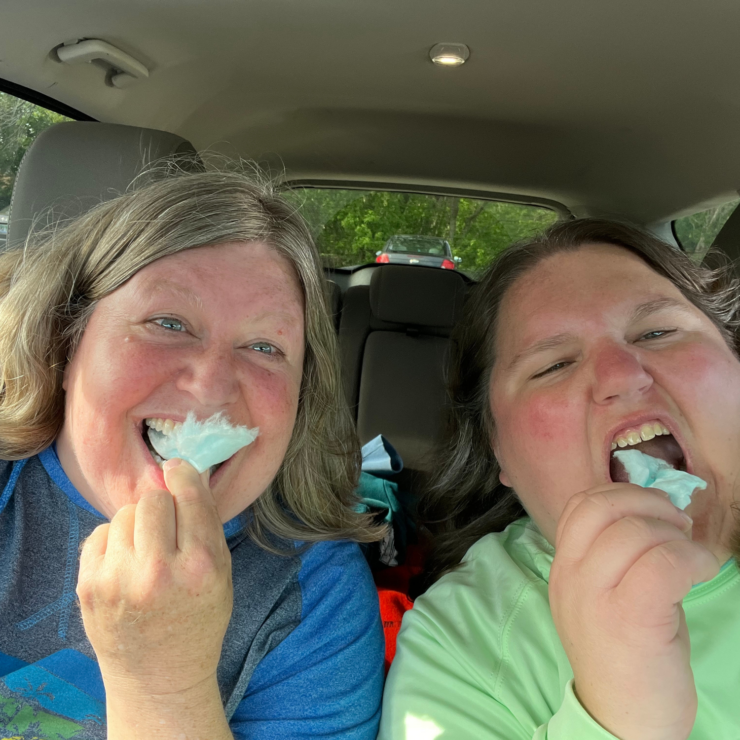 people eating cotton candy