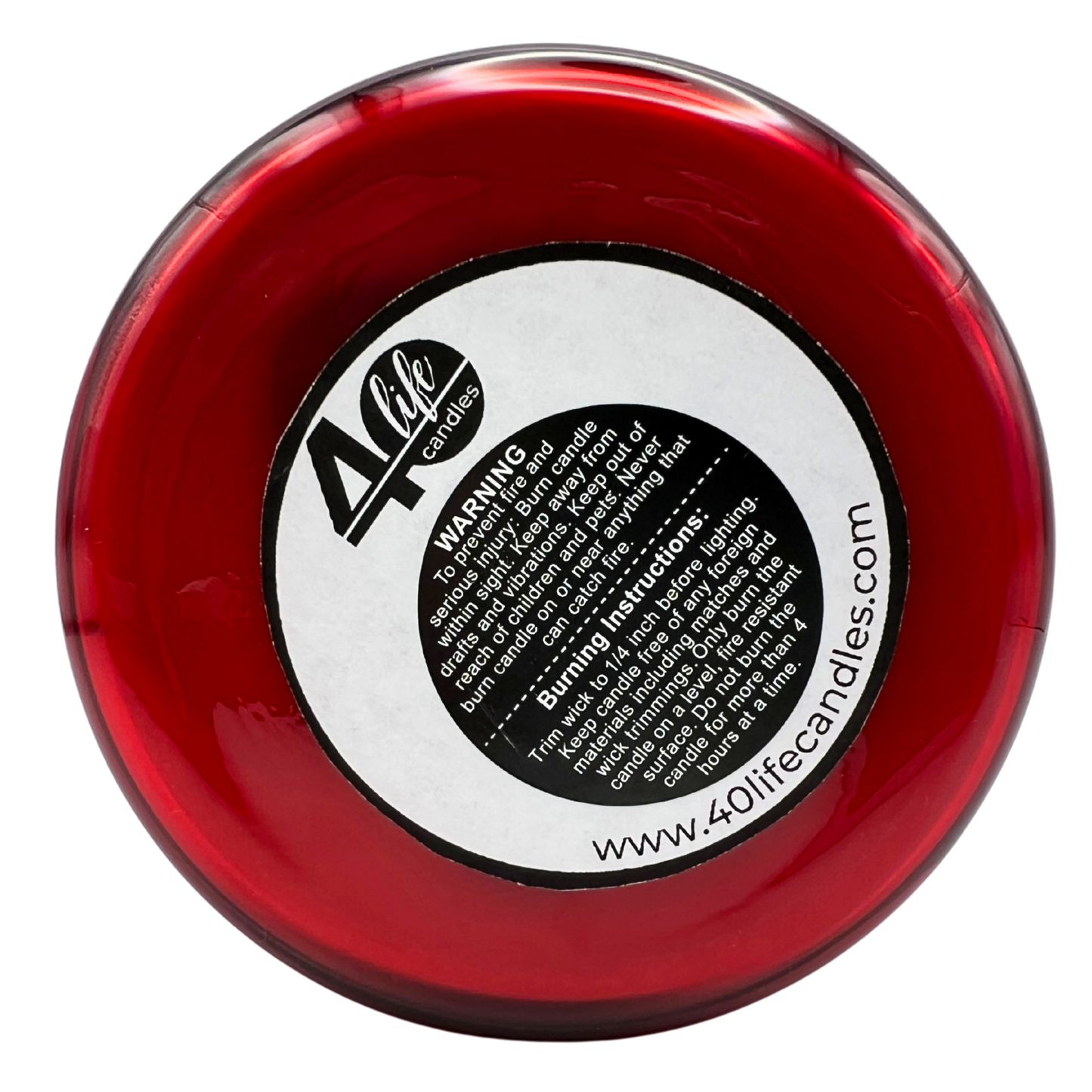 Red container with a label featuring '40 life candles' branding and warning text on a white background