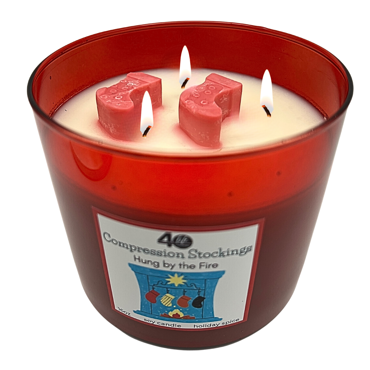 Candle with red container and 'Compression Stockings Hung by the Fire' label on a white background
