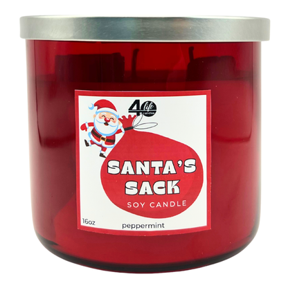 Red candle jar with a Santa Claus label on a white background