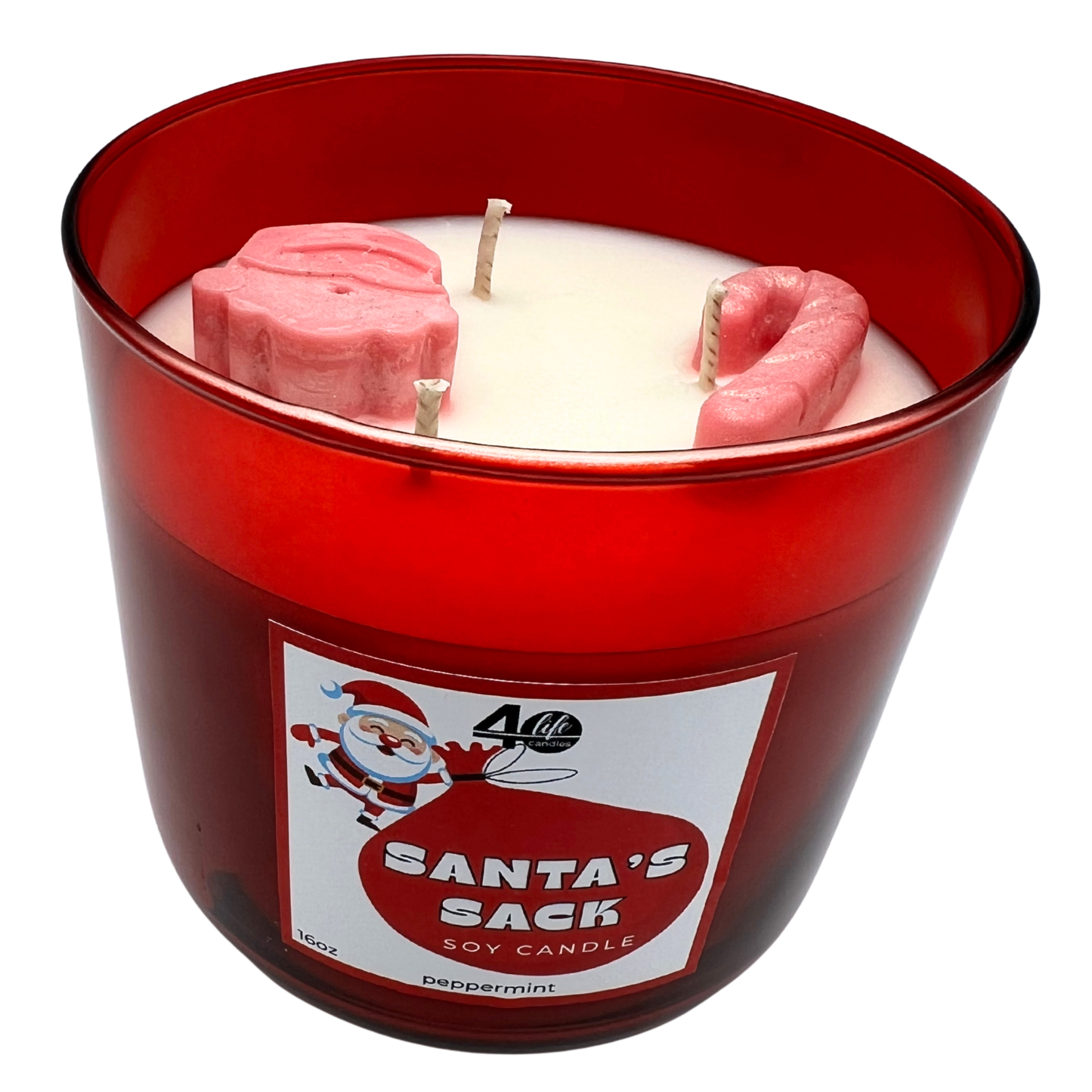 Candle in a red container with a Santa Claus label on a white background