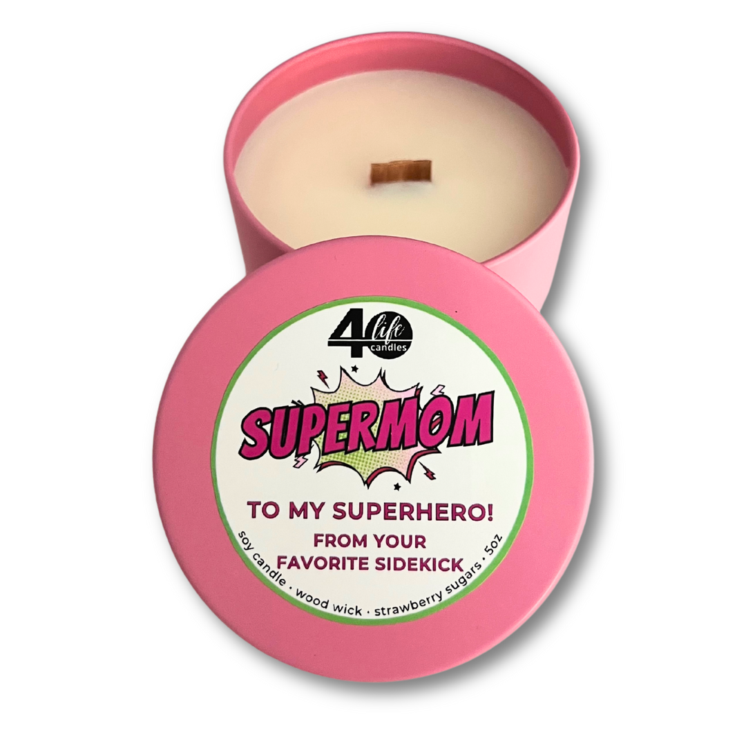 SuperMom soy candle in a soft pink tin with a wood wick.