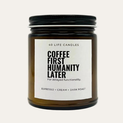 Candle jar with a humorous label on a cream background