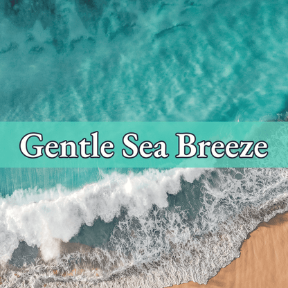 ocean with white cap waves and sand